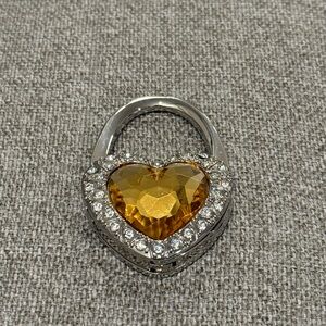 Heart-Shaped Gold and Silver Bag Holder